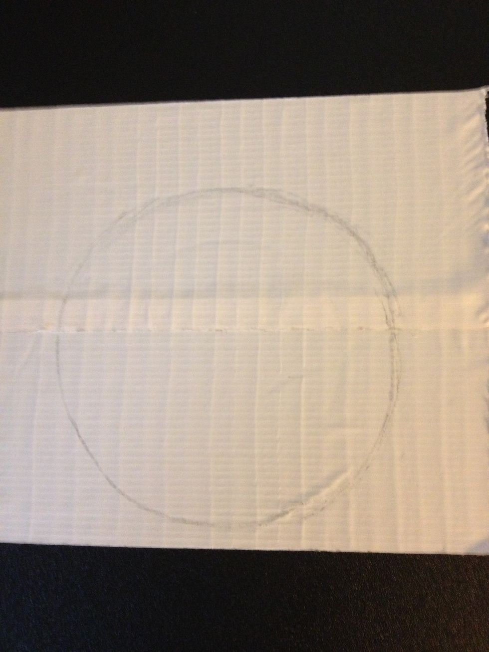 Create a sheet of duct tape a little bigger than the size of the shape you want. I traced a circle on the sheet so I would know where to cut.