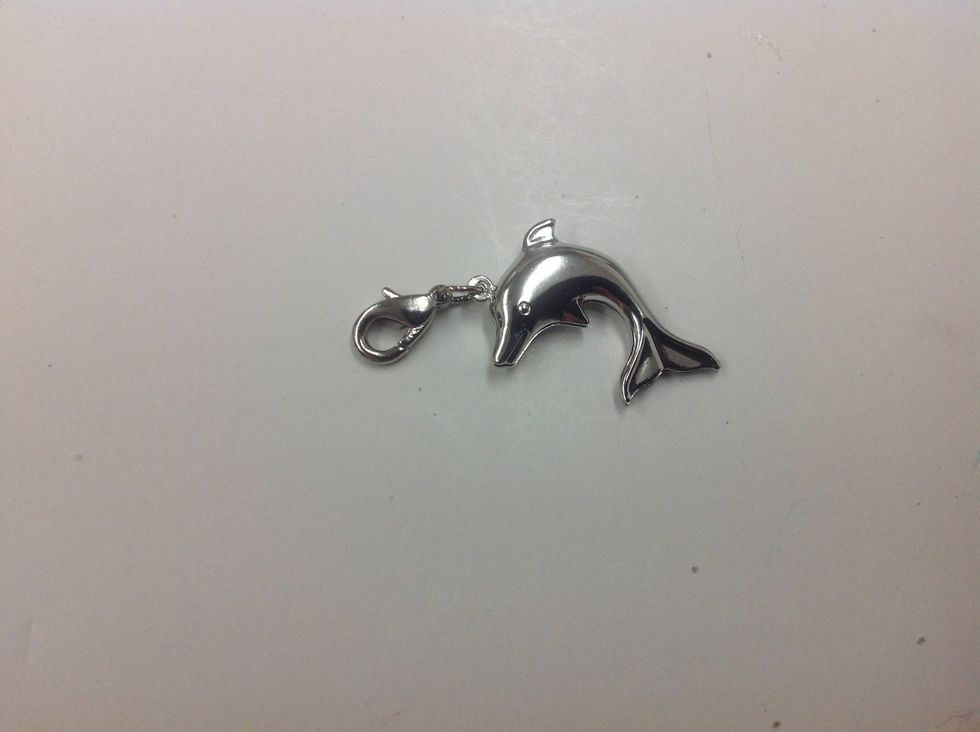 Create an interchangeable charm by adding a lobster clasp to the charm with a jump ring.