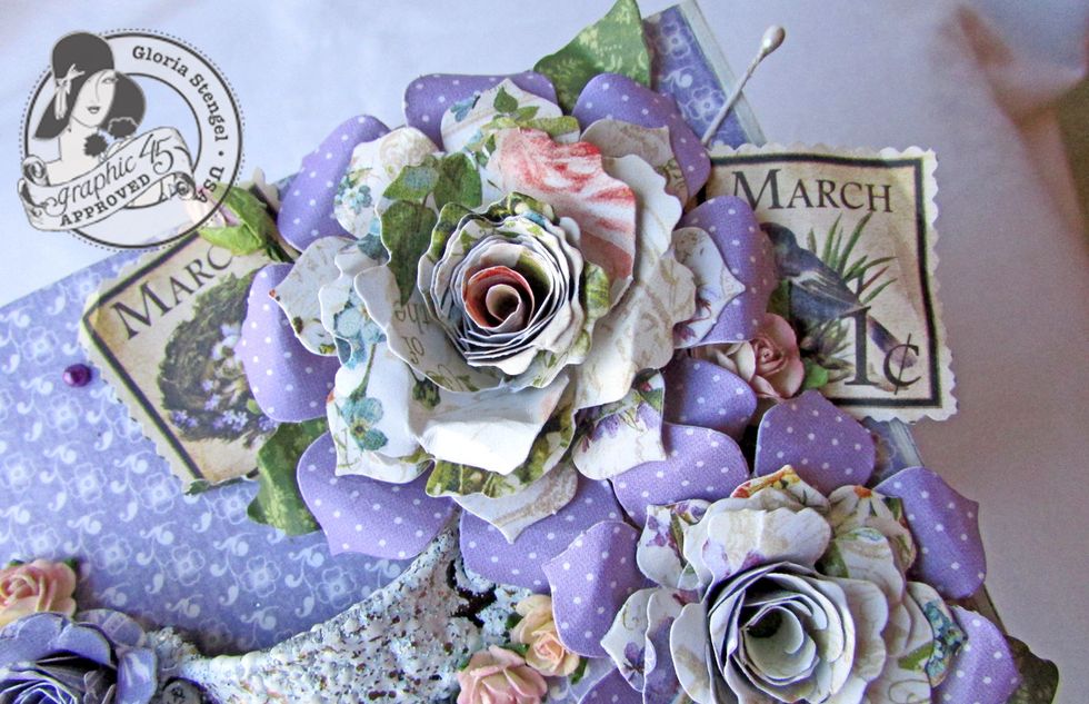 Create flowers from a combination of pre-made flowers and handmade flowers created from die cut shapes. Add other decoration on the box top and around the rim of the lid.