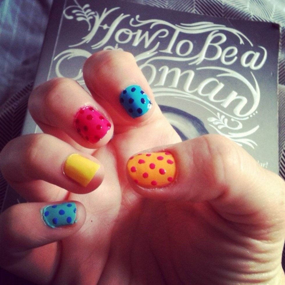 Create lines of diagonal polka dots on each nail