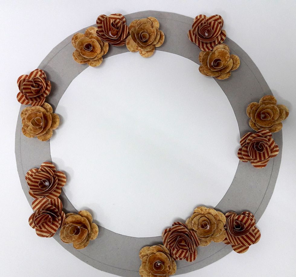 Create more flowers from Botanicabella - Summer Sonata paper and attach to chipboard circle.