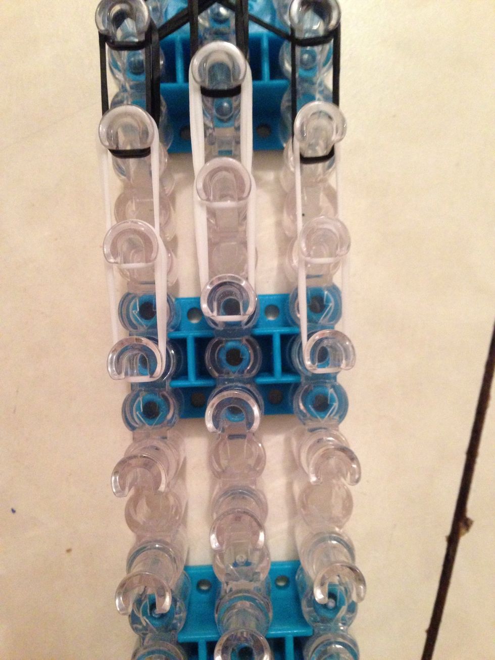 Create one more row of white bands like so