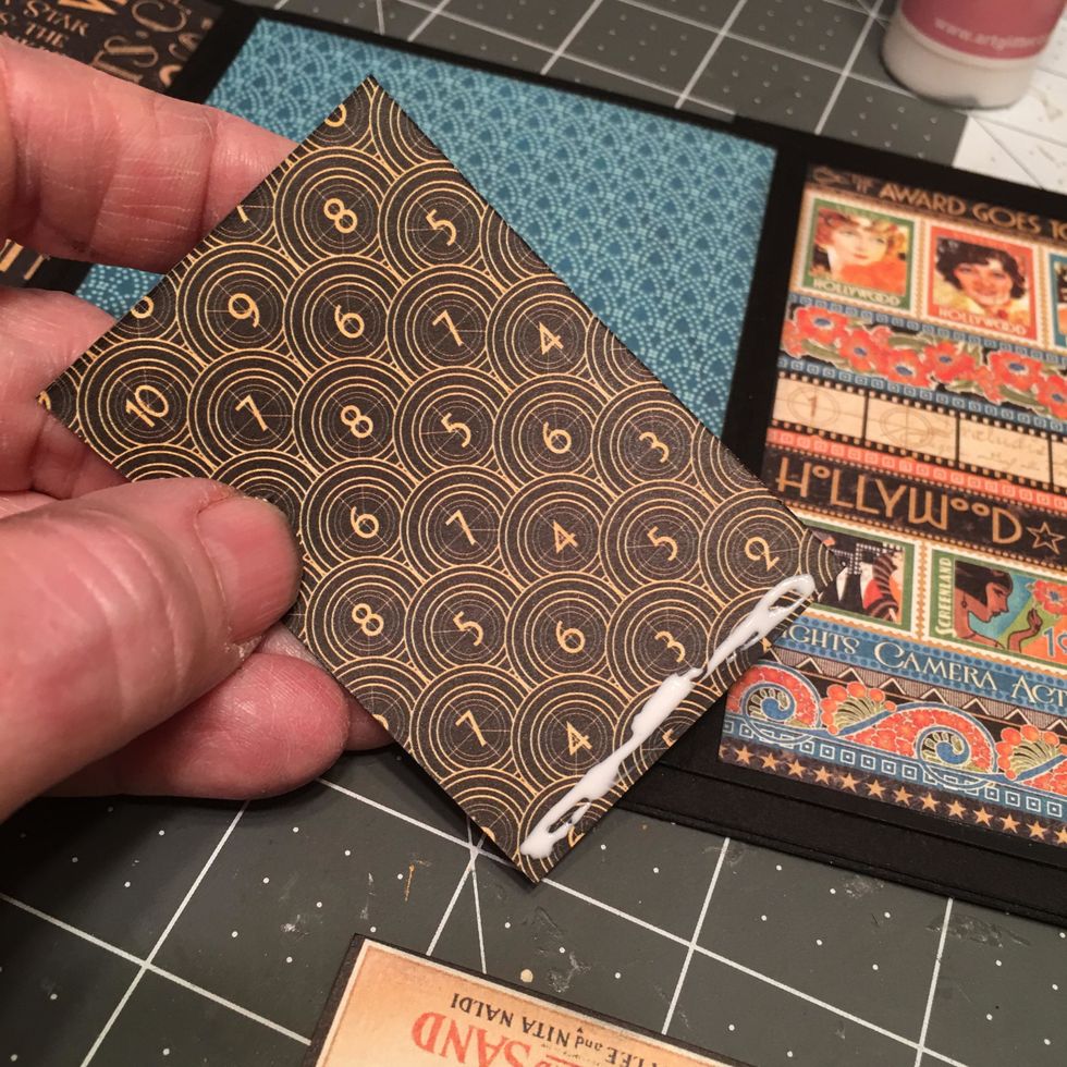 Create place card holders out of some of the other cut aparts by applying a line of glue on the back bottom edge.