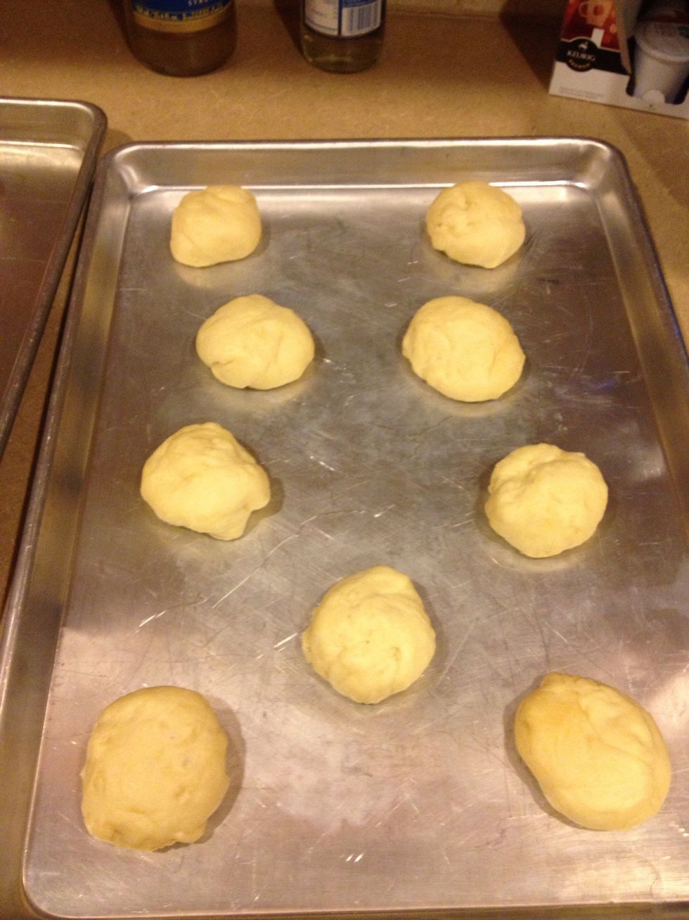 Create rolls from dough and place on ungreased pans to rise again