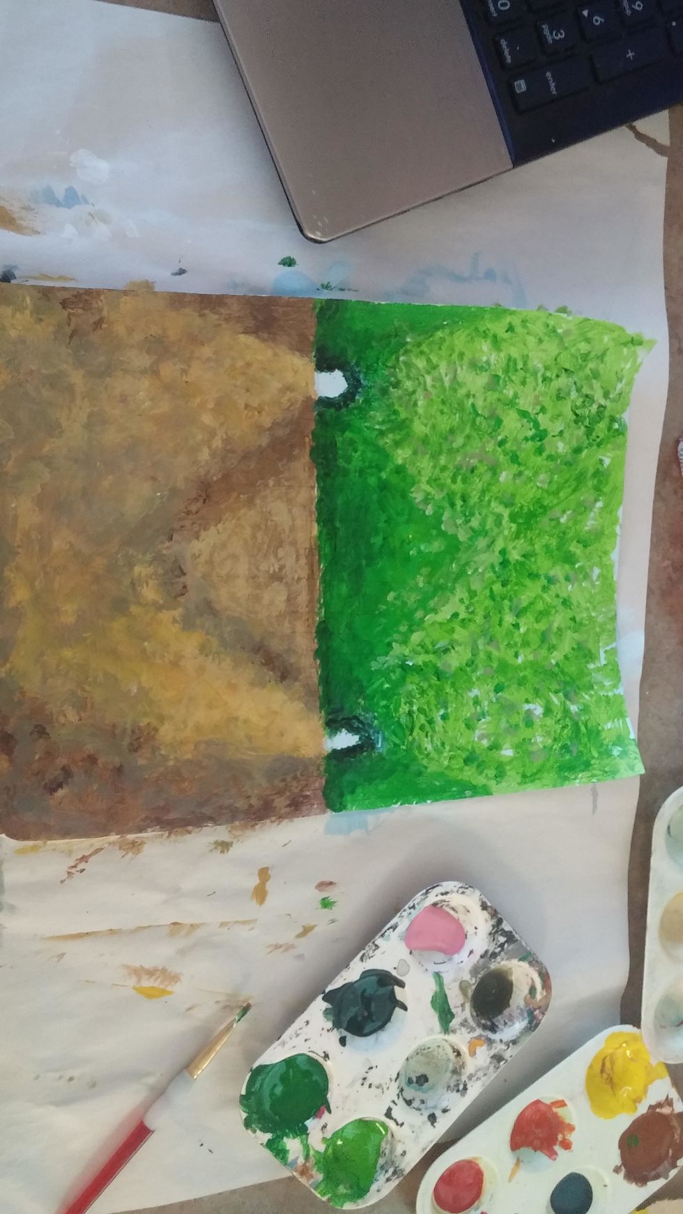 Create several different colors for the leaves. Dab and dot leaves throughout the sky. This will give texture to the leaves. Use a variety of similar colors.