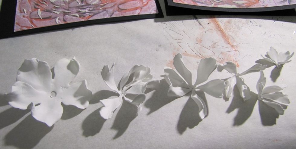 Create some flower.I have some handmade foam flowers, but you can use paper flowers if you want.