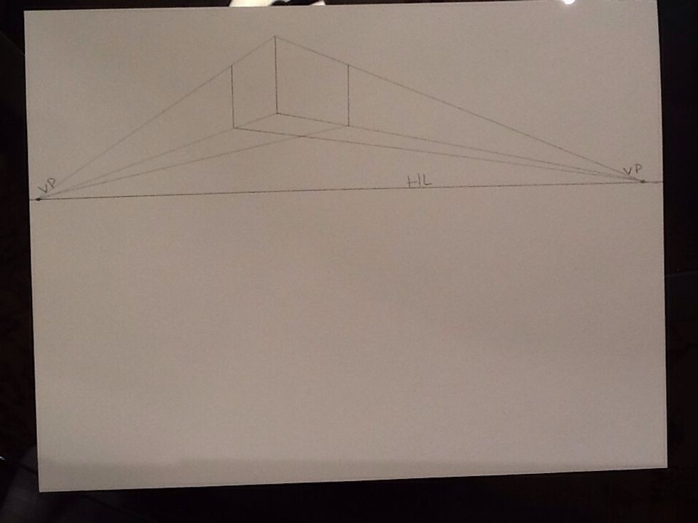 Create the bottom of your box by connecting each of the two lines you just created to their opposite vanishing point.