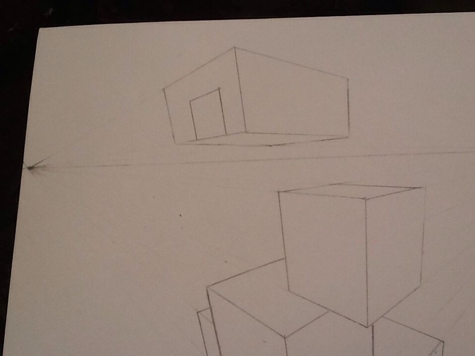 Create the top by lining it up with the vanishing point on the same side as the box. ( if the opening is on the right side of the box, line your ruler up with the vanishing point on the right).