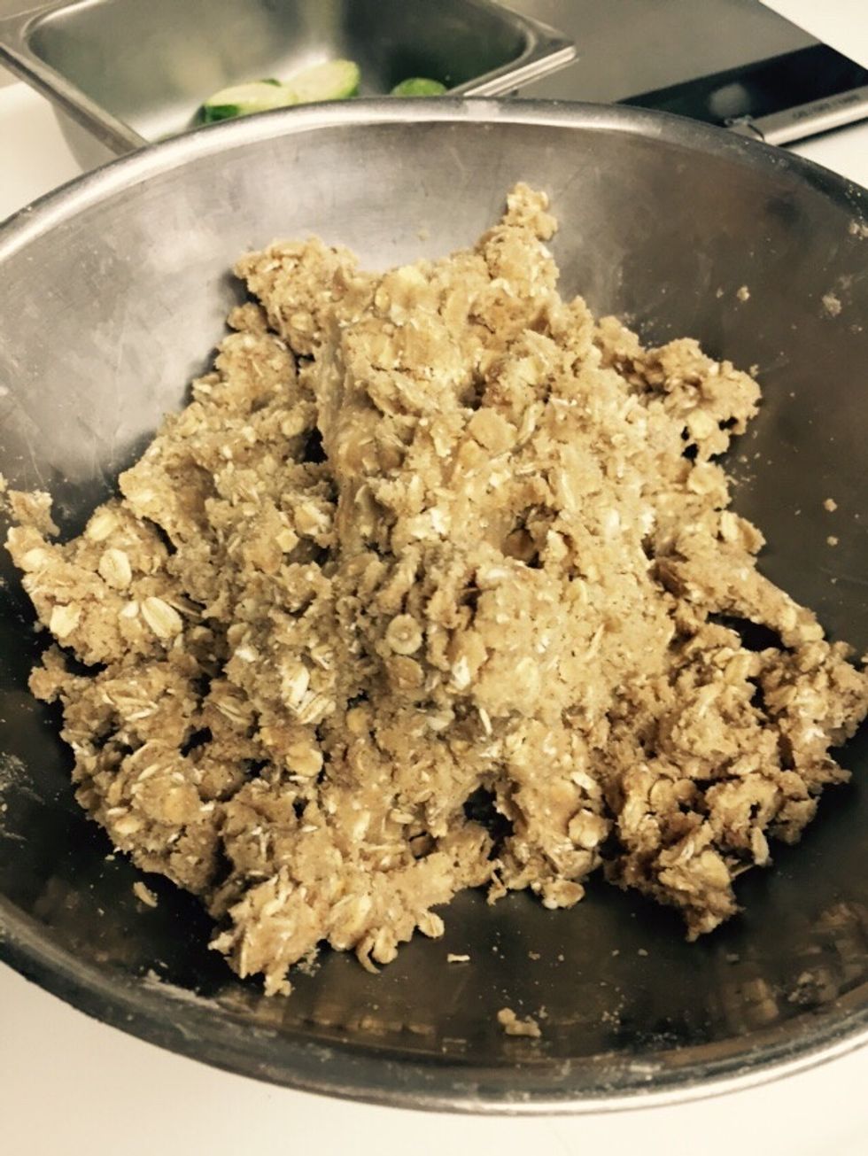Create topping using butter, rolled oats, brown sugar and desired seasonings.