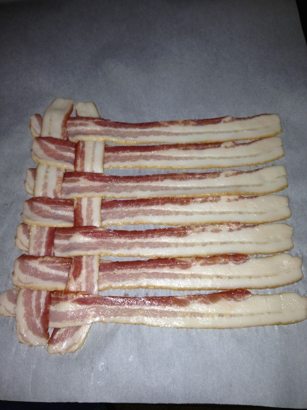 Create your bacon weave. Start with the horizontal rows and weave the vertical pieces in.  Make sure you use thick cut bacon.  Anything thinner won't work out as well.