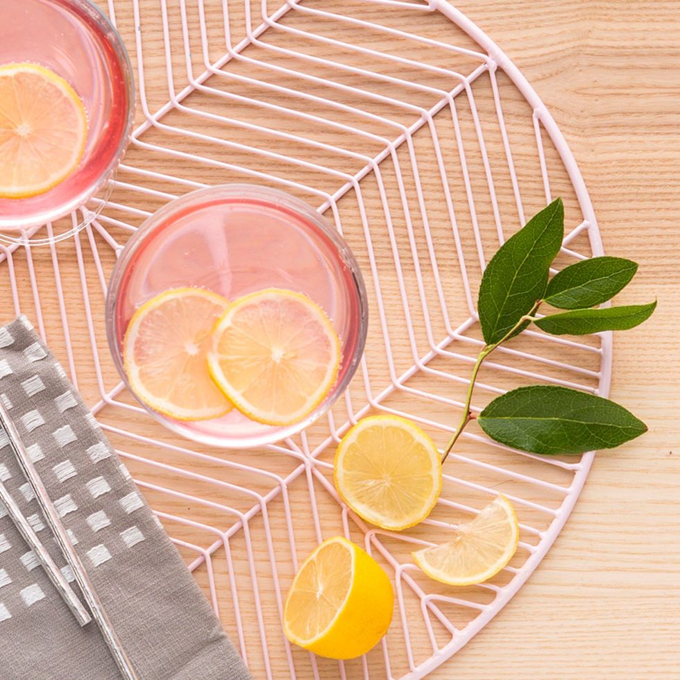 Cropping in on one primary object and letting the rest fall off the edge really helps to get the viewer to focus on what YOU want them to focus on (like this delicious pink citrus cocktail!).