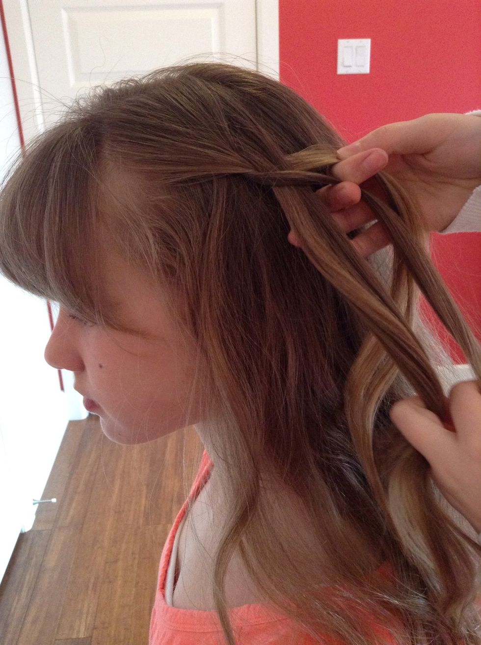 Cross it over in the middle...