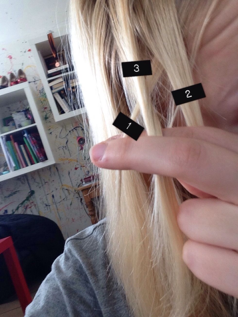 Cross the 3. section over the two already crossed sections, like in a French braid