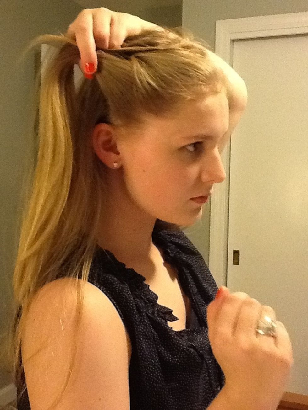 Cross the right section over so it becomes the middle section.