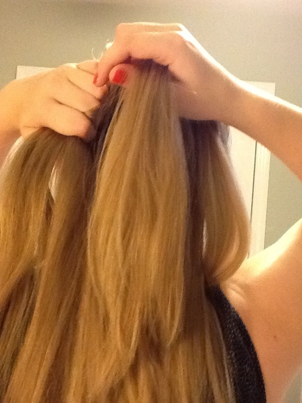 Cross the right section over so it becomes the middle section.