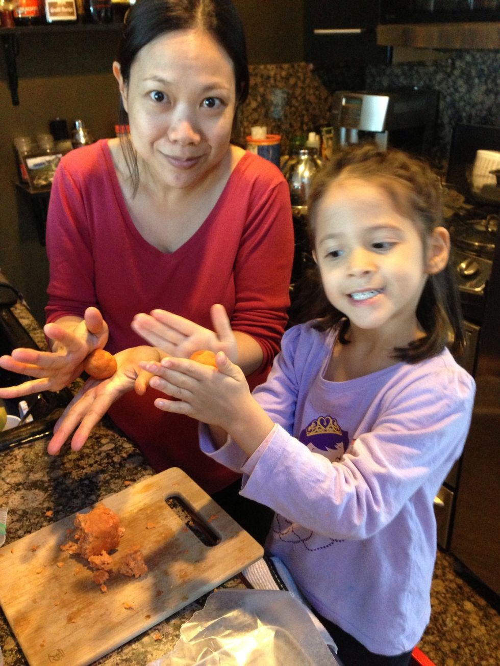 Crumb up the cake , then mix in a little frosting just enough to be able to roll