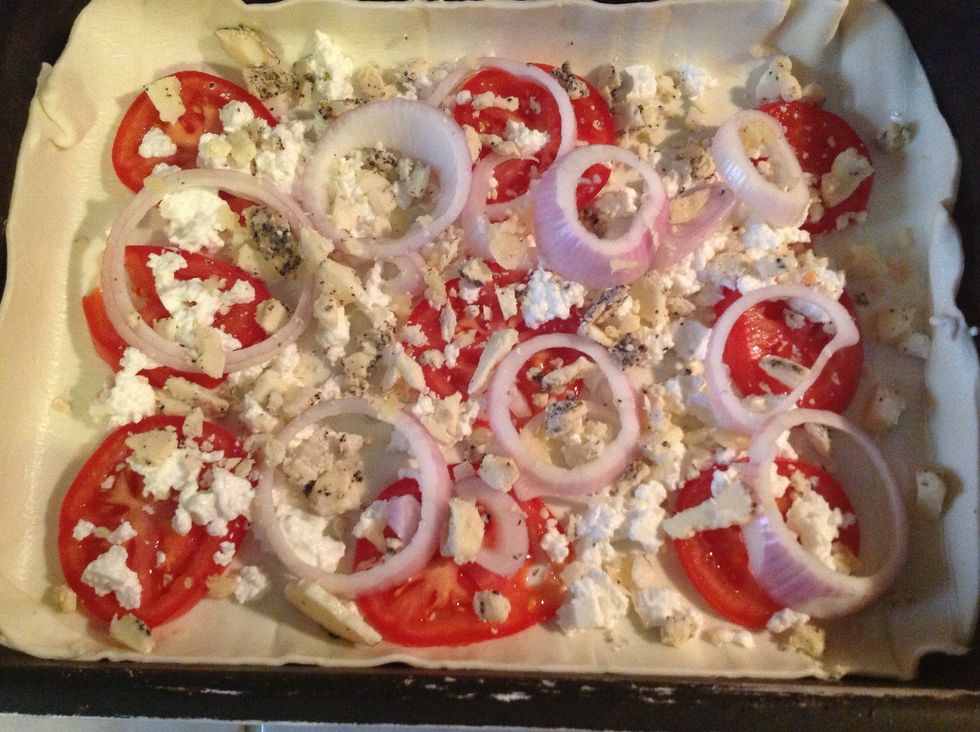 Crumble the dry Gozo Cheeslets - Gbejniet niexfin tal-Bzar - and add the crushed garlic, too.