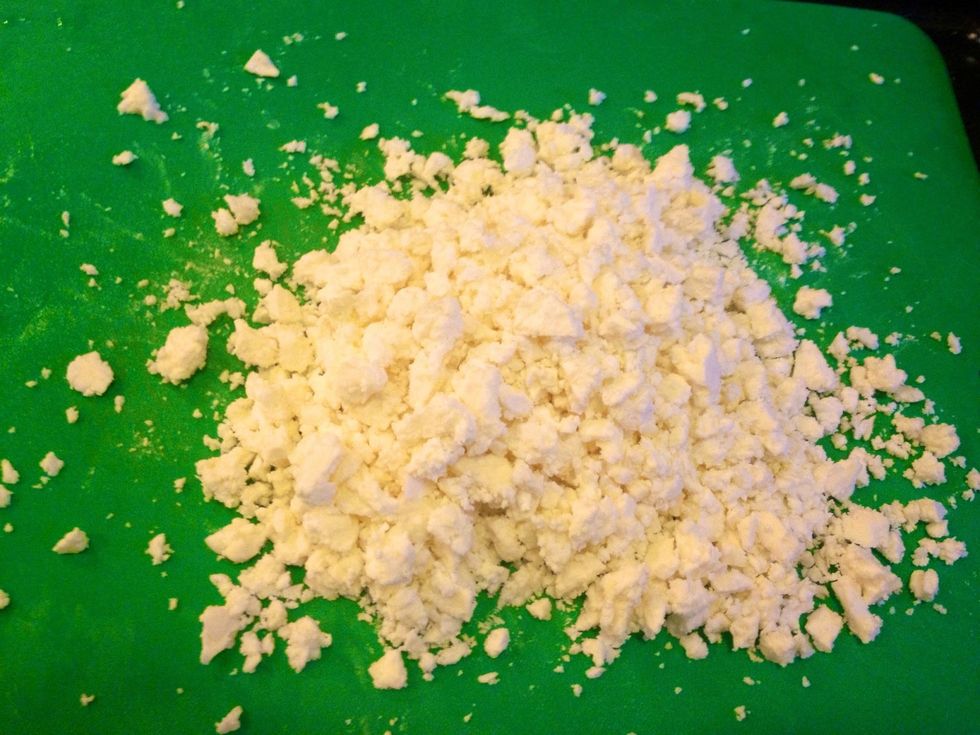 Crumble the feta cheese.