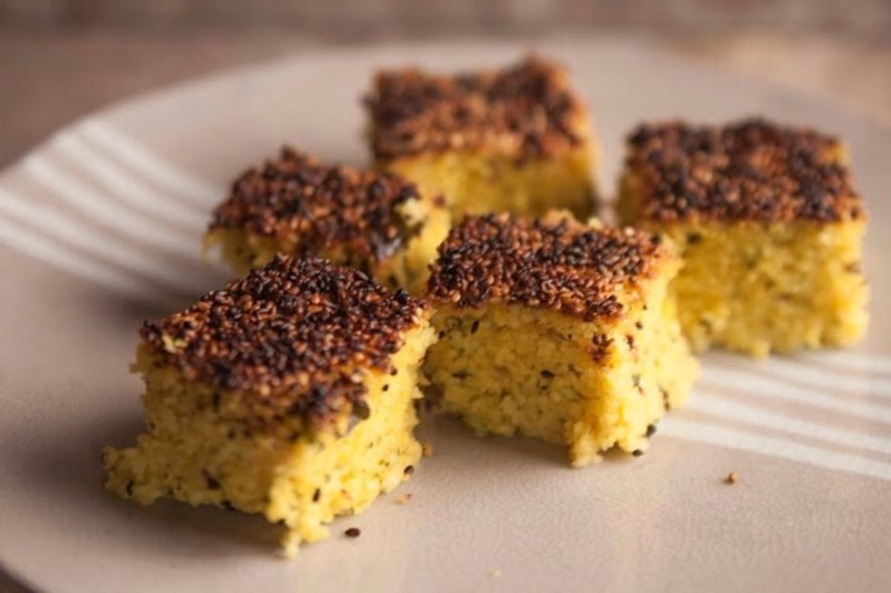 Crunchy on top with a soft center and a bit of kick from the chilies, this is served as an evening snack, for tea or even brunch or lunch. Basically anytime is the right time for Handvo.