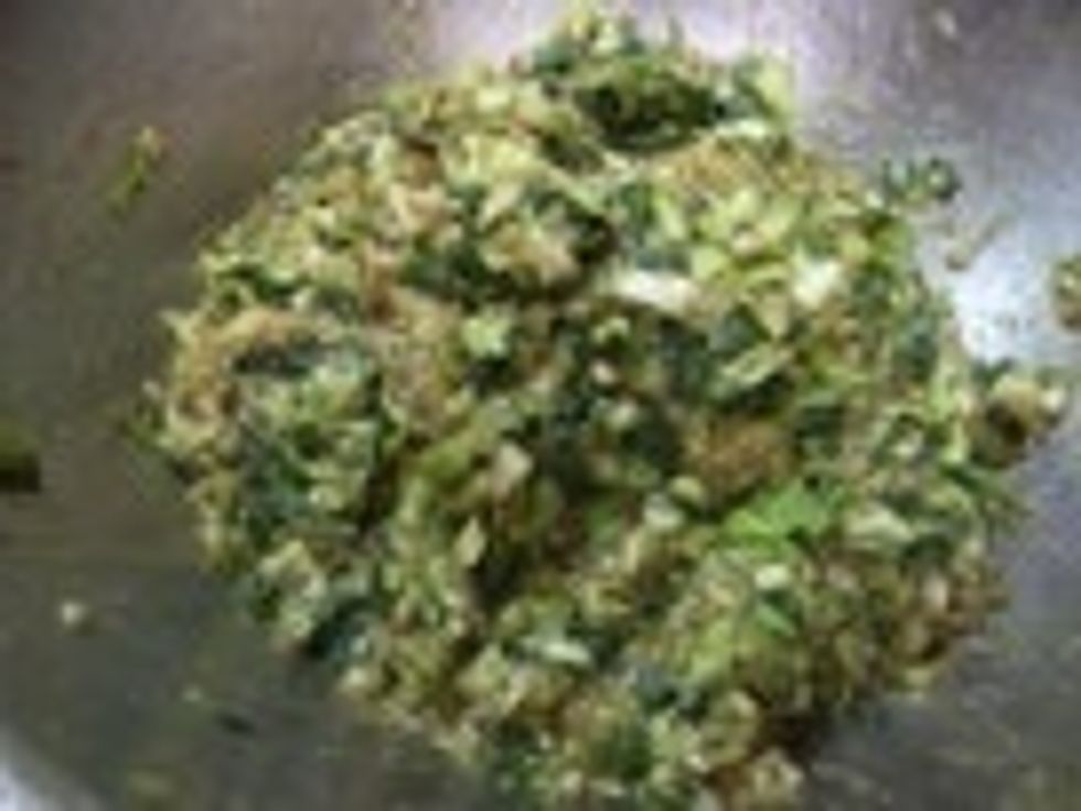 Crush 1 clove of garlic over the top and knead