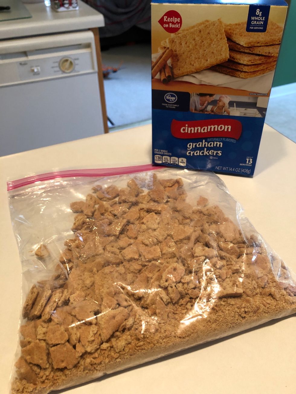 Crush 15 graham crackers in a large ziplock bag. Set aside.