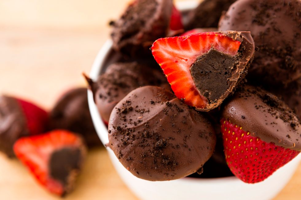 Crush a few remaining Oreos and sprinkle the tops with Oreos. Place berries in fridge until set.