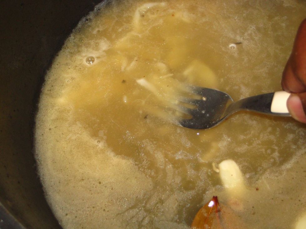Crush about 5 cloves of garlic using a fork and discard the rest(optional)