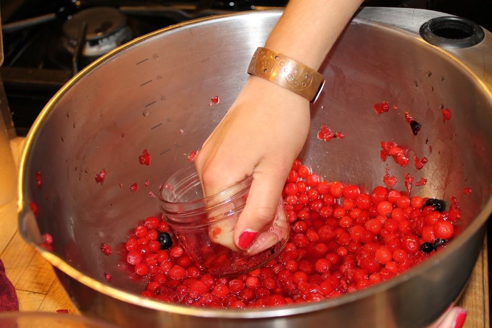 Crush berries, an efficient, clean, and easy method is to use a jar. Then measure out exactly 4 cups of berries and 4 cups of sugar.