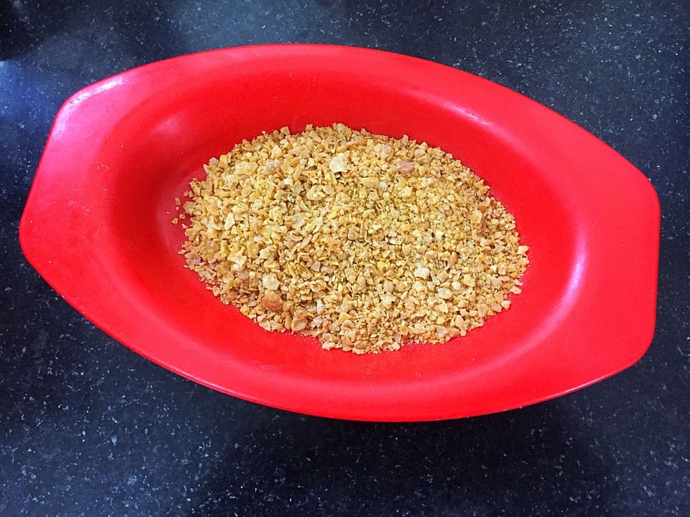Crush cornflakes in to fine powder.