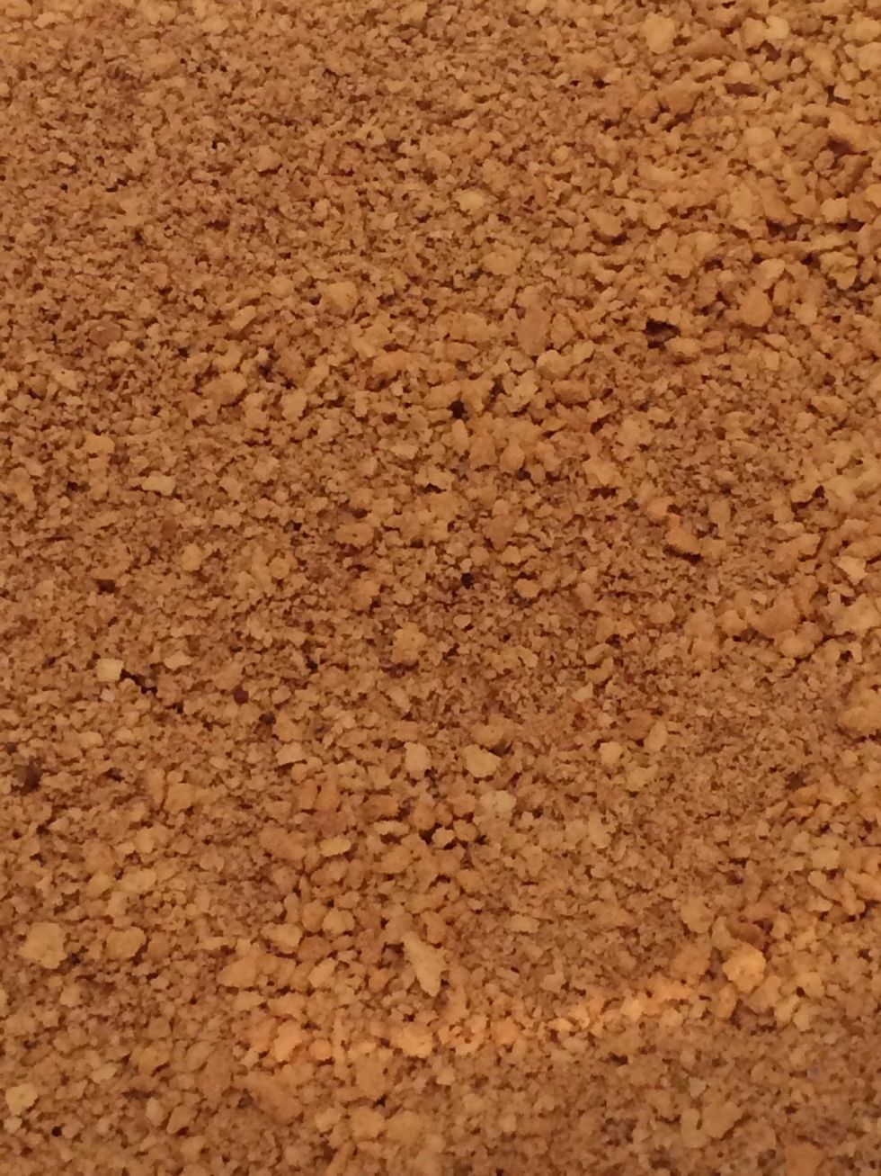 Crush graham crackers and mix with cinnamon and nutmeg.