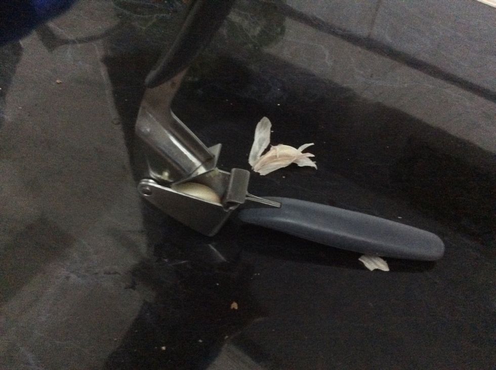 Crush one garlic and put it in with the mince
