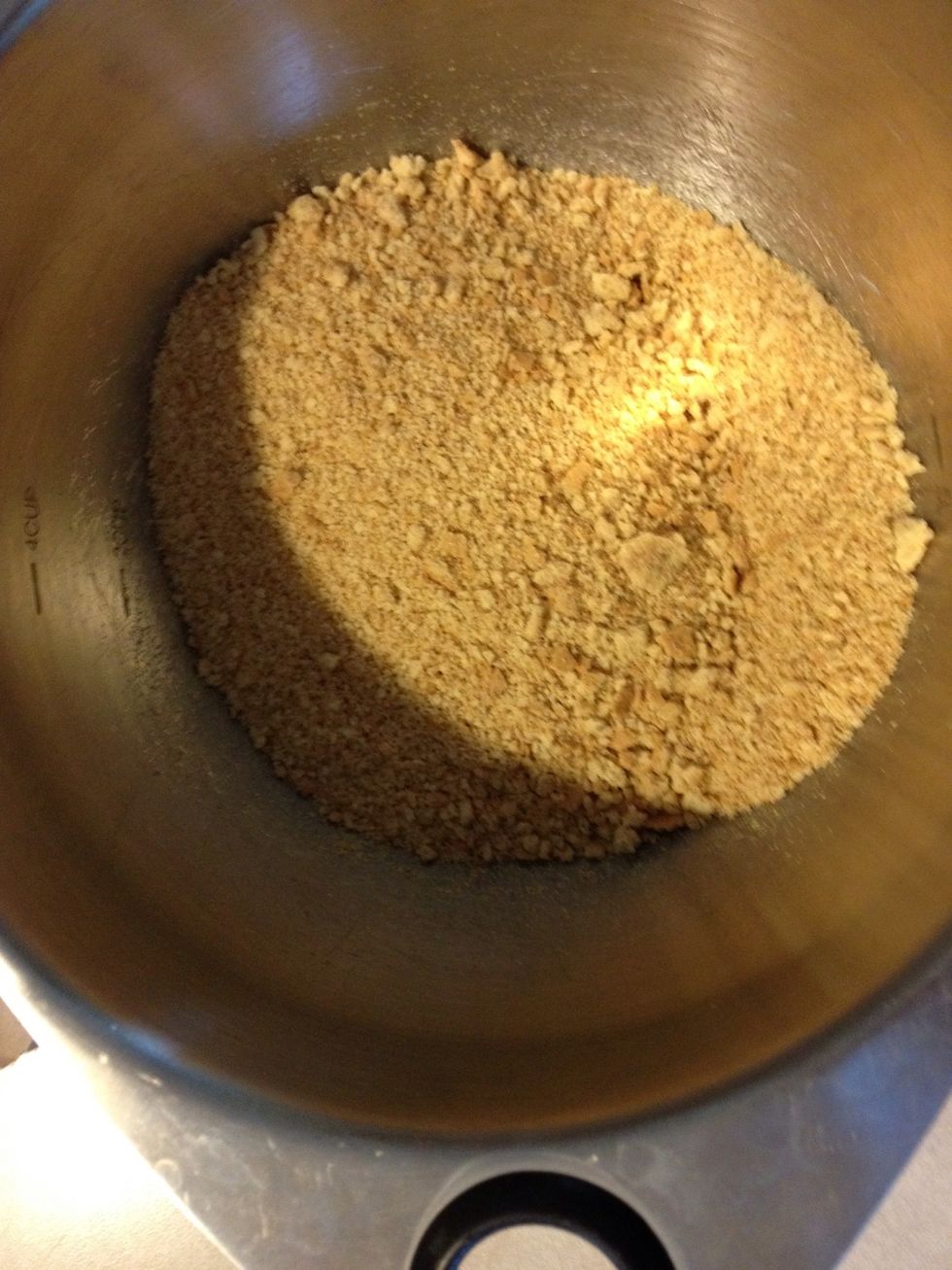 Crush one package of graham crackers. Should make about 2 cups