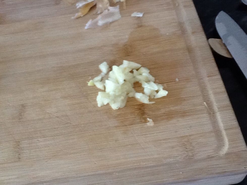 Crush or chop the garlic, or here you can you use per crushed garlic that comes in a jar.