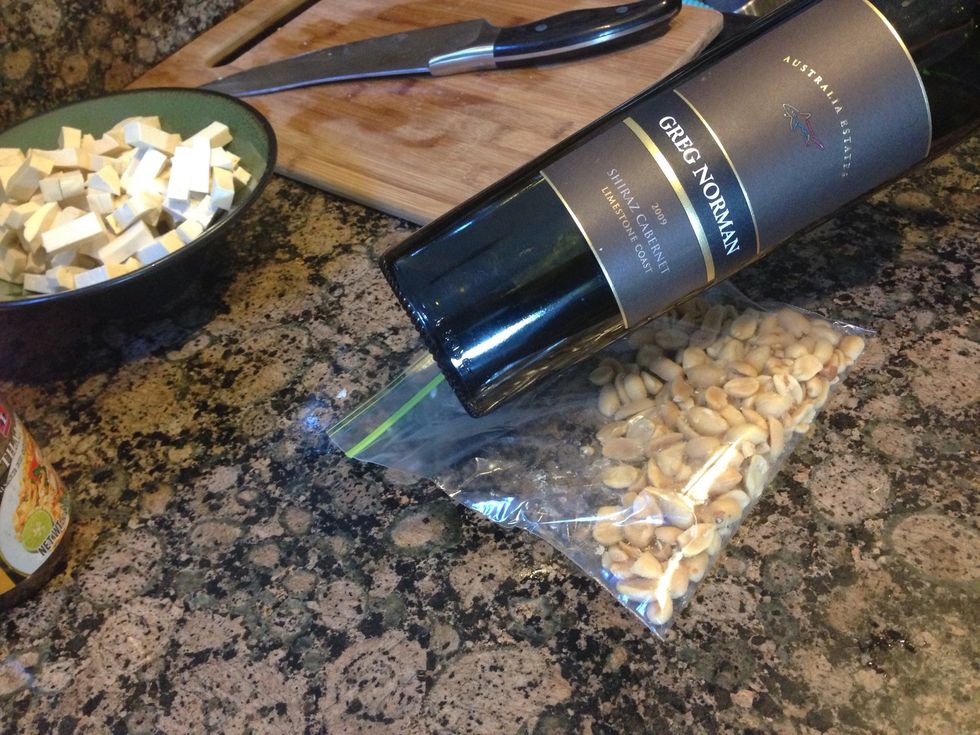 Crush peanuts, about 3 spoons
