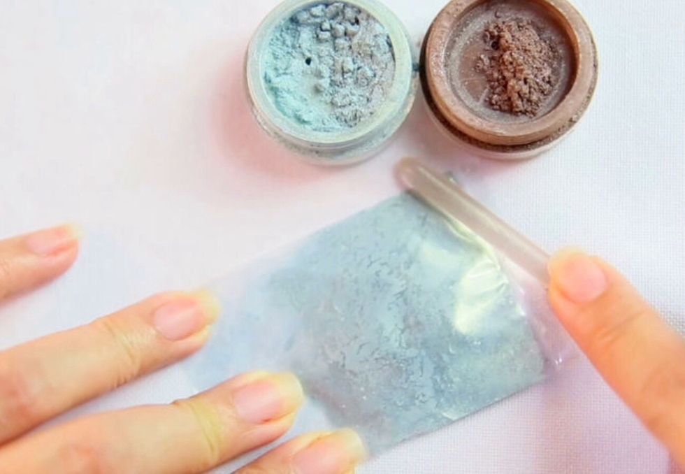 Crush the eyeshadow if necessary. (The solid blocks need to be crushed before they can be used).