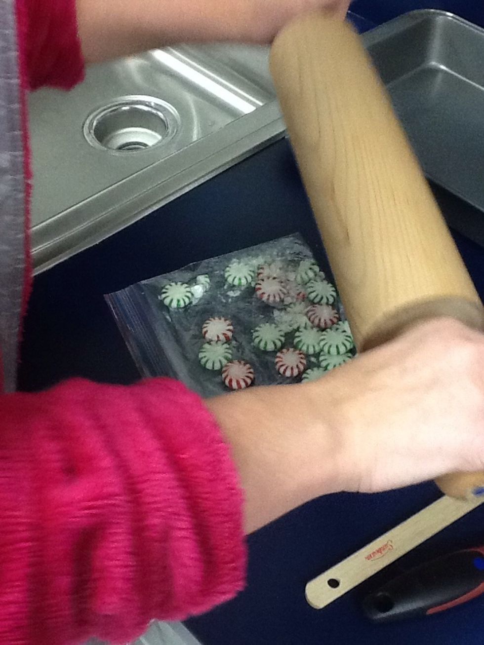 Crush the peppermints using a rolling pin.