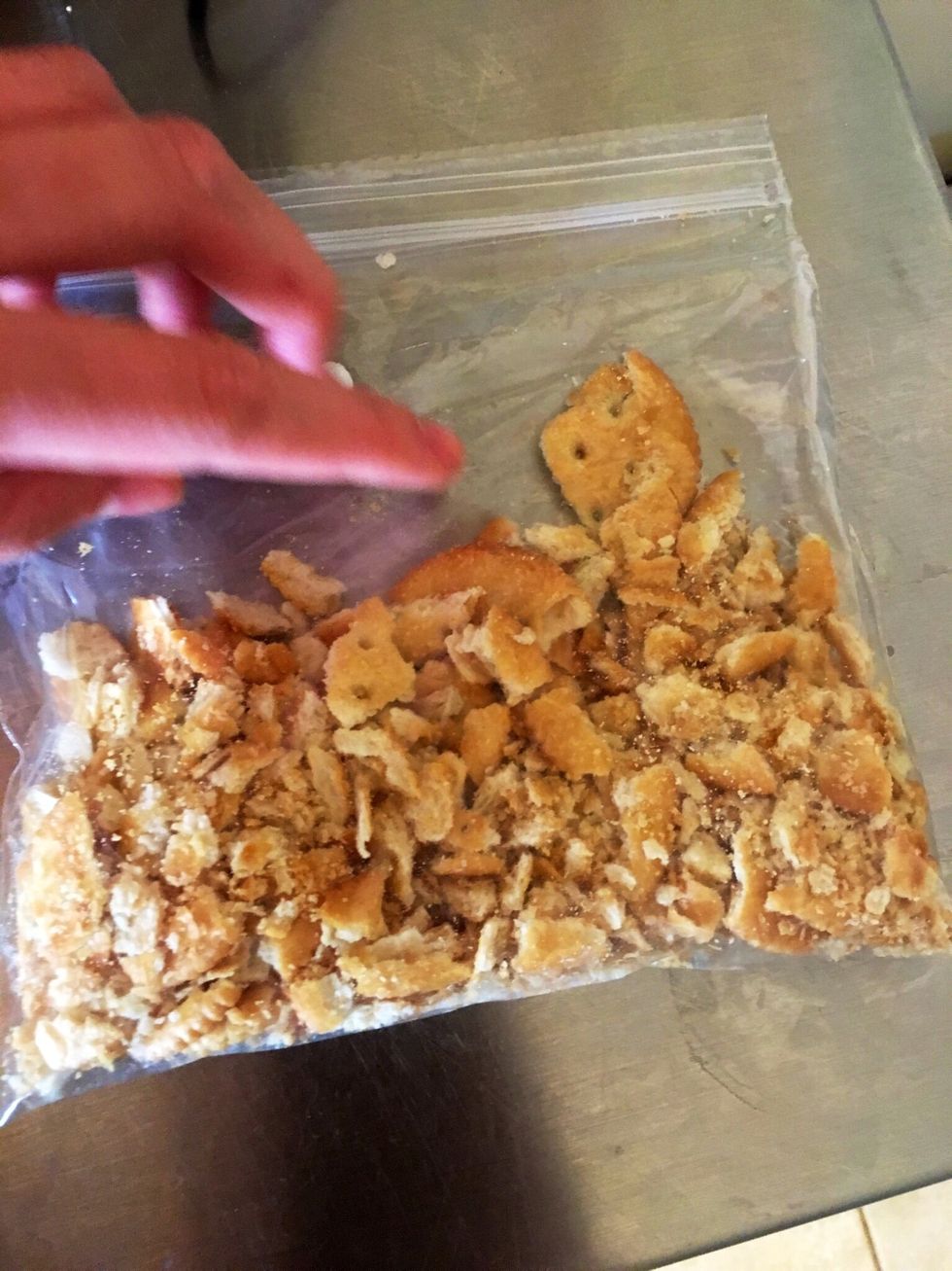 Crush up one sleeve of ritz crackers