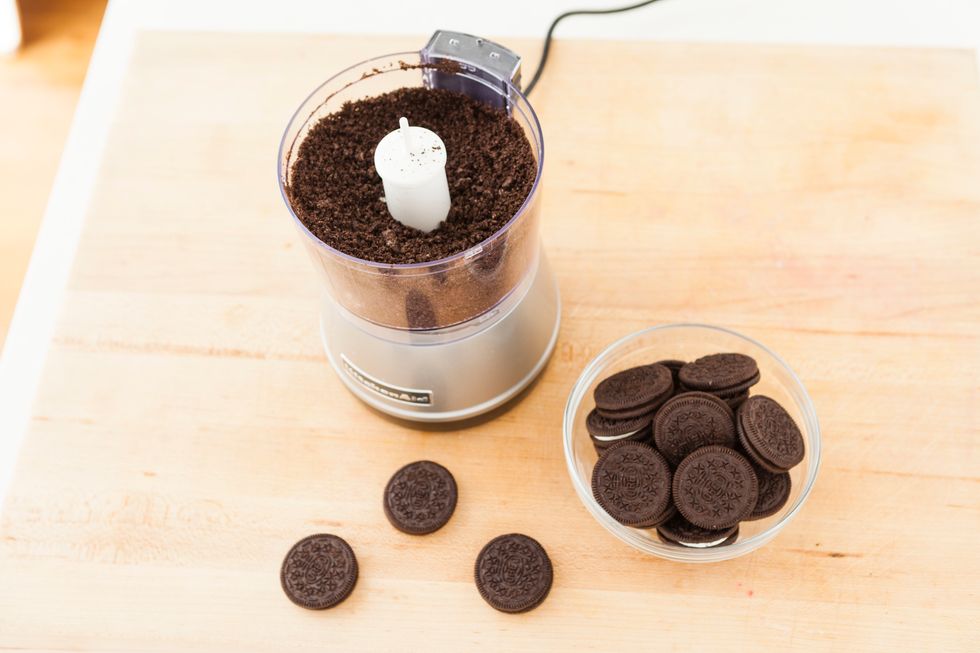 Crush your entire package of Oreos in the food processor.