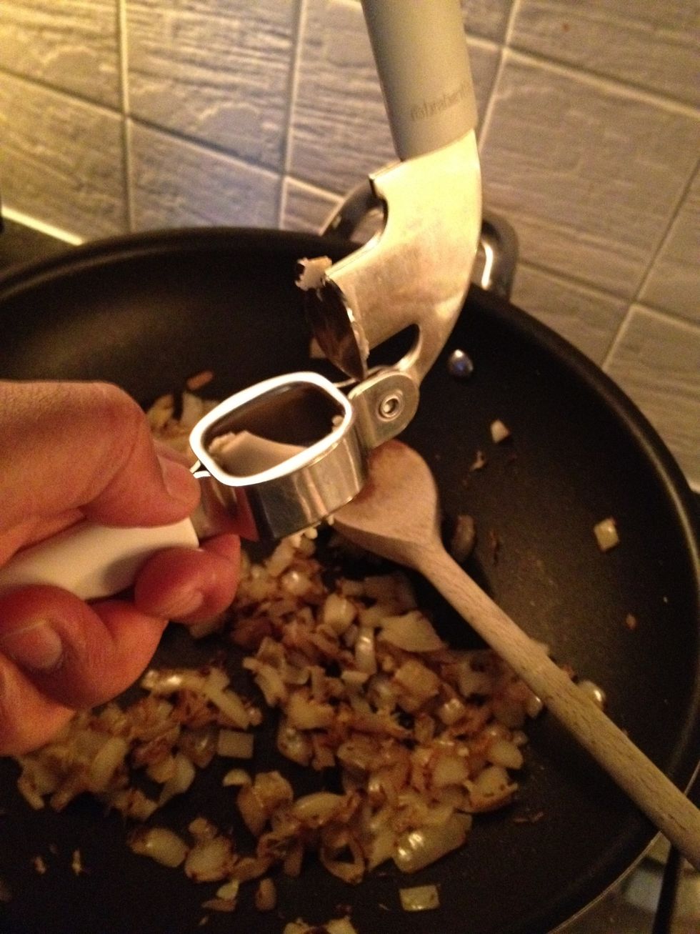Crush your garlic into the wok. Cook gently. Crushing garlic increases the strength of flavor.