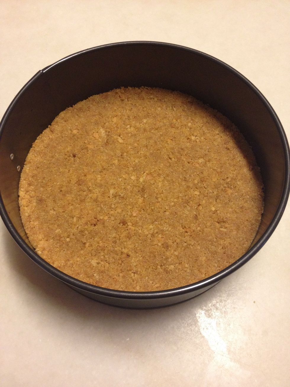 Crushed the digestive biscuit and mix it with melted butter. Press the mixture into an 8" spring form pan. Refrigerate for 10-15 minutes.