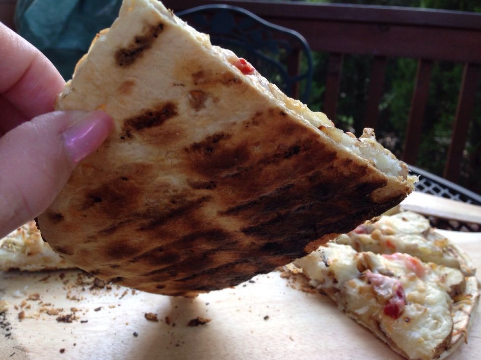 Crust is fire roasted and crisp.