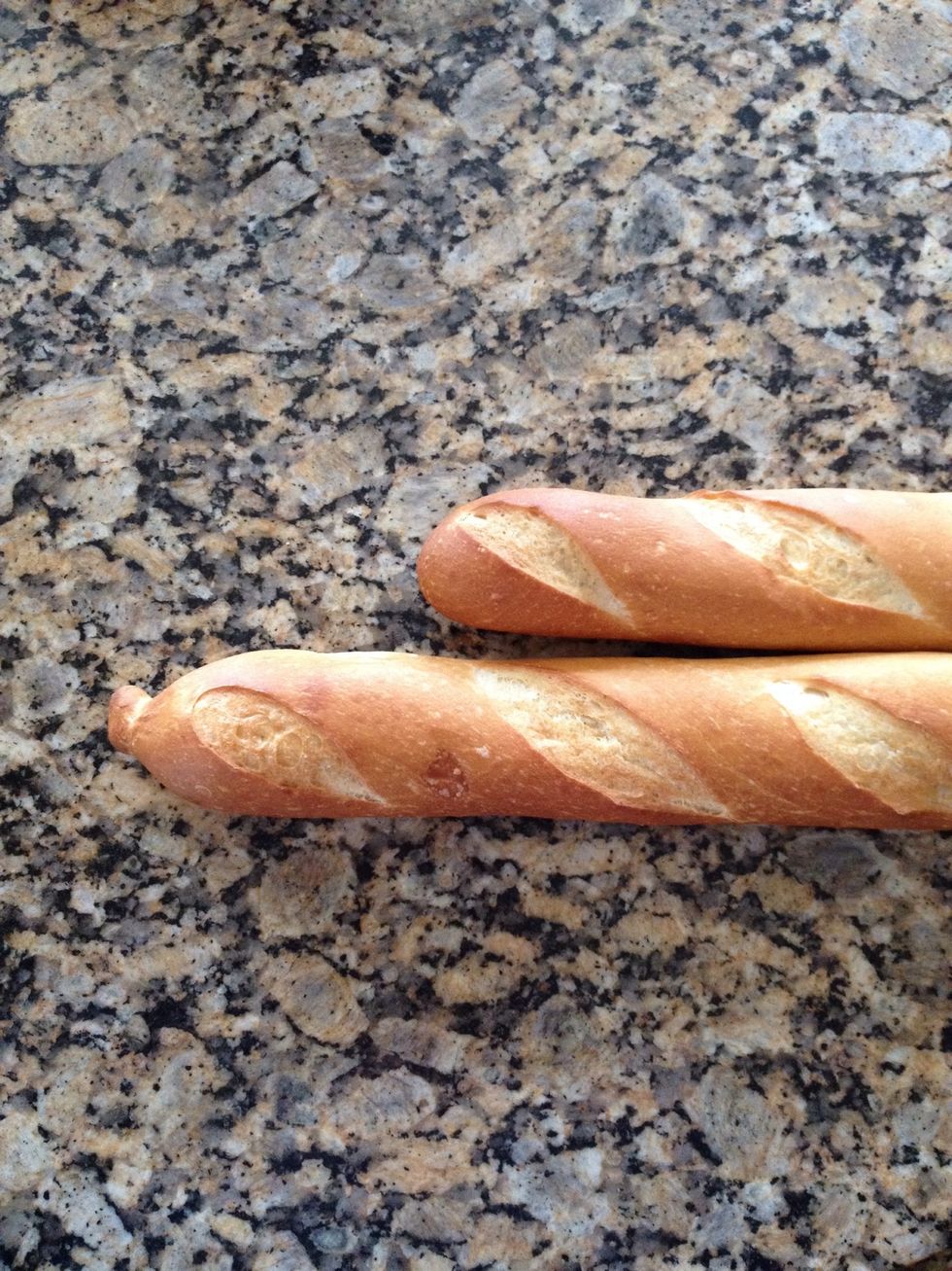Crusty baguettes ..I use two. Slice and place pieces in dish. You can use a challah or brioche bread as well. I prefer the crustier bread. But a raisin or cherry challah might be pretty fantastic too