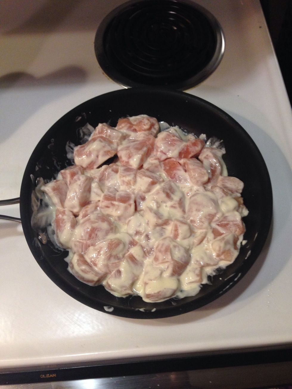 Cube chicken and put it in the pan and add the ranch let it marinade for 30 mins. After marinating cook chicken till done.