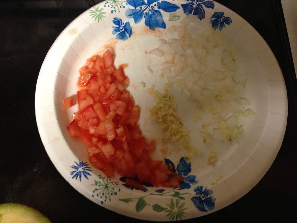 *Cube the tomato (I like mine small)        *Cube the onion (small but not too small) *Dice the garlic (it's essential to cut into very small pieces) (powdered garlic works just fine)
