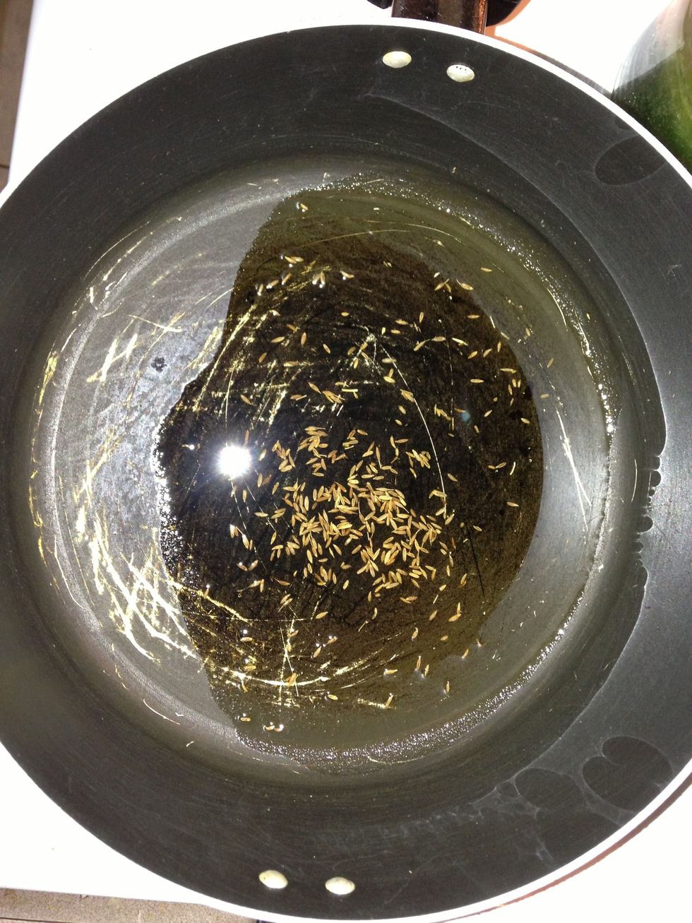 Cummin seeds added to warm oil