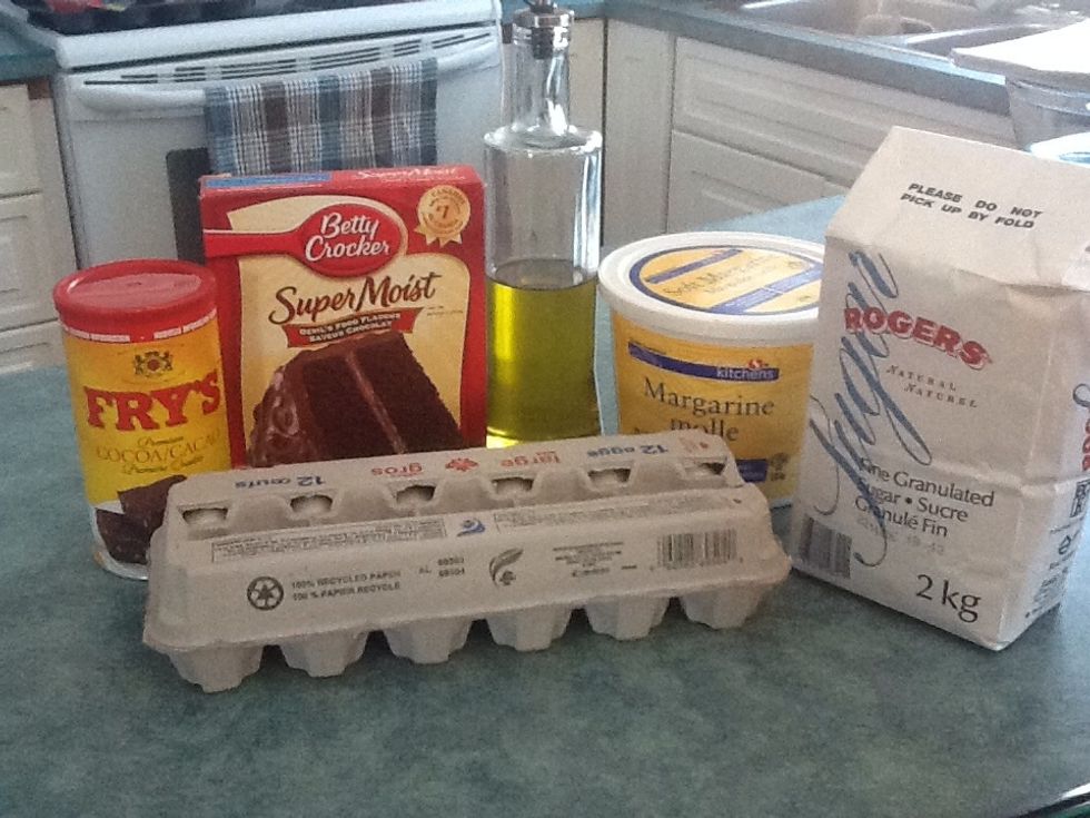 Cupcake batter supplies. Betty Crocker cake mix Eggs Milk Vegetable oil.