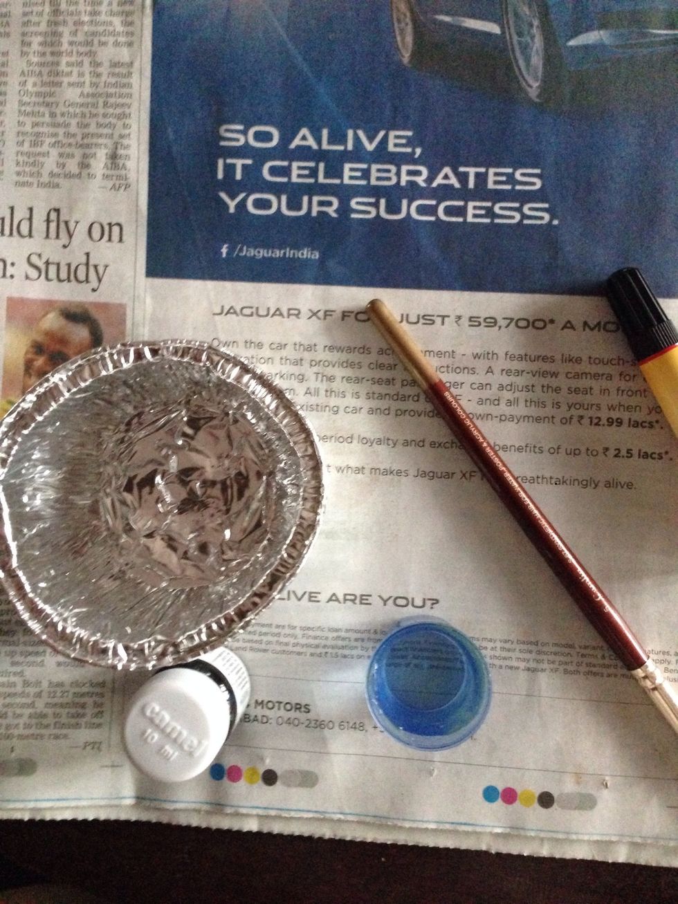 Cupcake mould, Scissors,tissue papers, glue , poster colours or water colours, painting brush and water