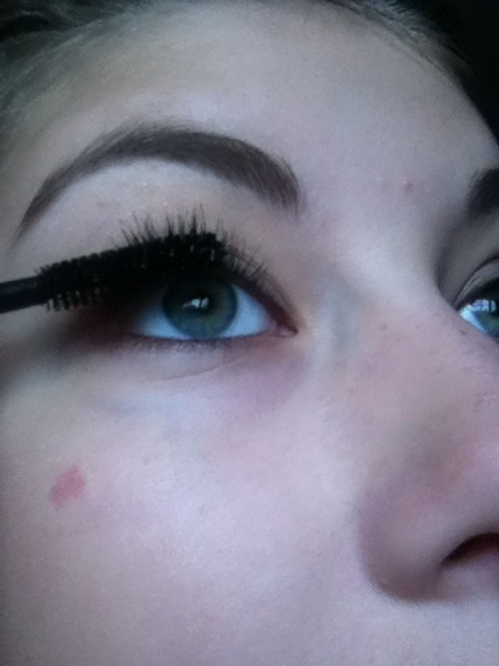 Curl and apply mascara to top and bottom lashes.
