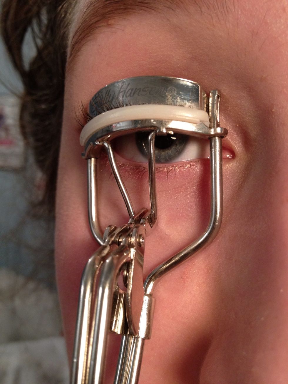 Curl eyelashes.