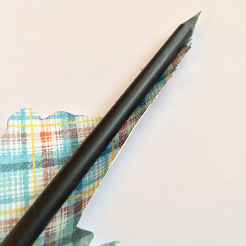 Curl lighthouse element with the help of a pencil as shown.